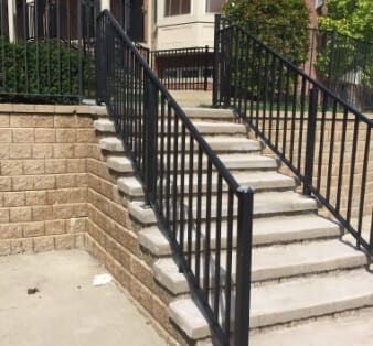 Newly-renovated outdoor stairway and stone wall